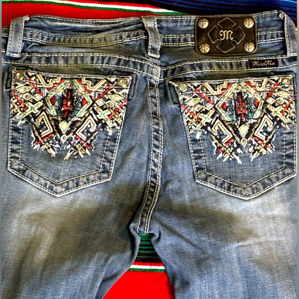 Women’s bootcut miss me jeans with bling pockets